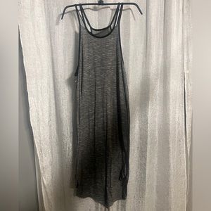 Lightweight dress with small slit in the back. Size medium.